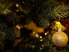 Christmas tree with golden hanging bauble