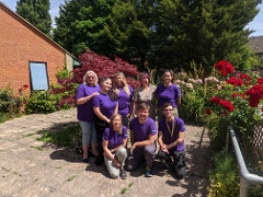 Community Wellbeing team posing for a group photo