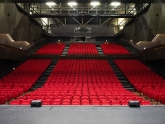 The view from the stage looking at 1000 red seats in the main auditorium