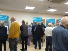 People looking at exhibition boards at the Ash Road Bridge Consultation