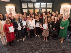 group of people with awards at Mayor's Awards