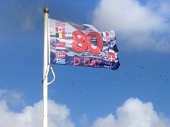 D-Day 80 Flag of Peace features country flags and the caption D-Day 80 6 June 2024