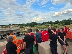 Scouts with VFLs project manager Colin at Ash Road Bridge